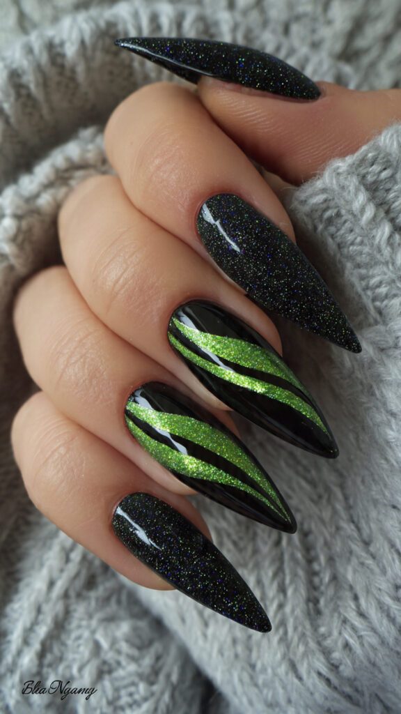20 Spooky Nails to Try This Halloween: Creepy, Cute, and Stylish Ideas 21 20 glitter black stiletto nails with neon