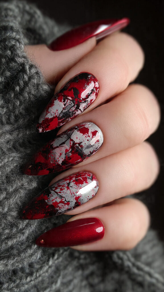 20 Spooky Nails to Try This Halloween: Creepy, Cute, and Stylish Ideas 7 6 blood splatter almond nails with abstract