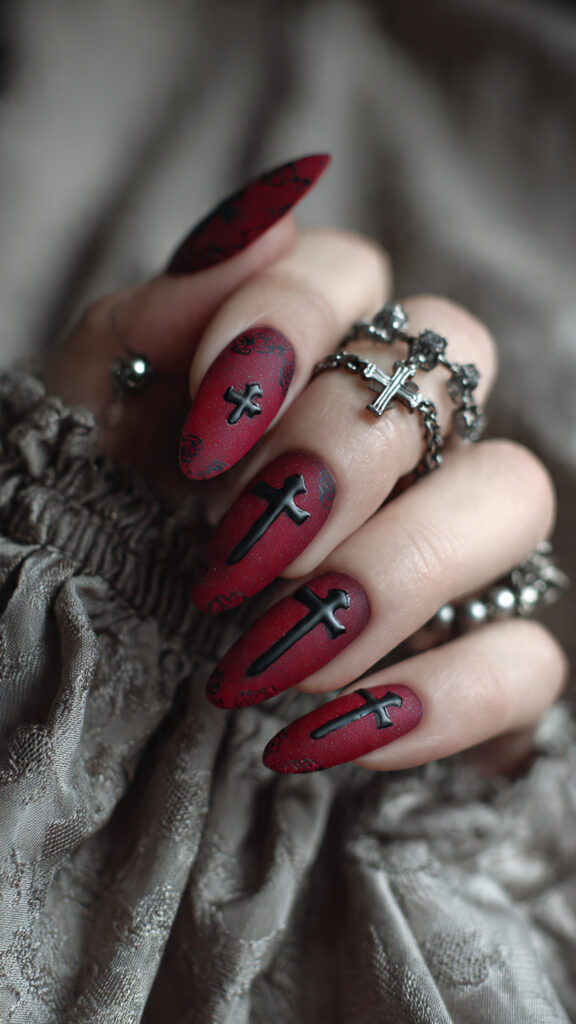 29 Vampire Nails That Are Dark, Chic, and Perfect for Halloween 23 crimson oval nails with black crosses matte