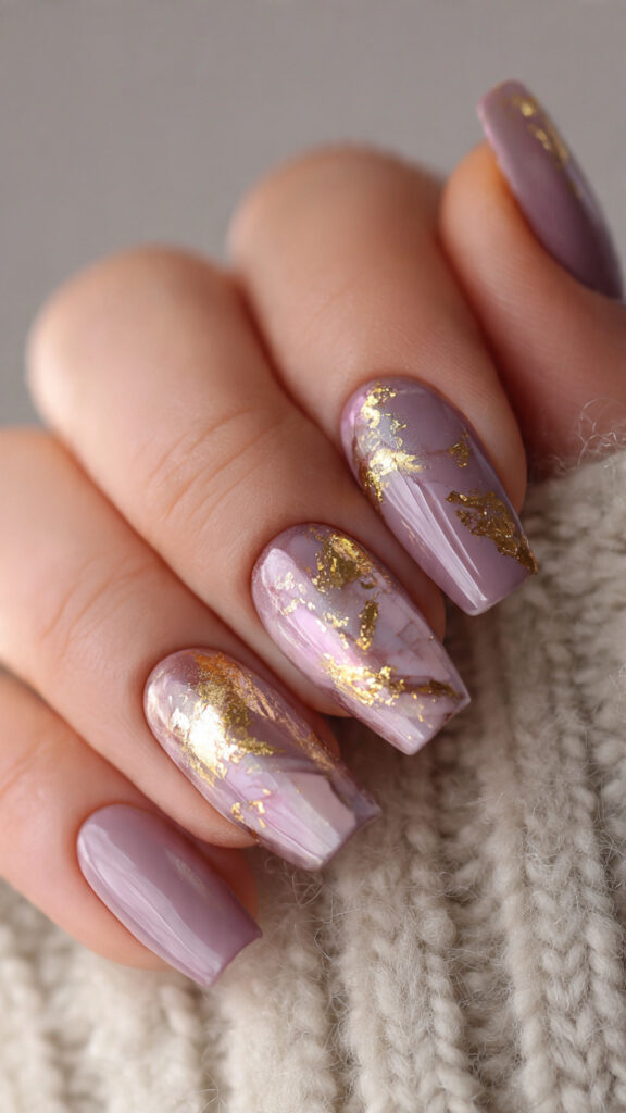 16 glossy mauve nails with gold rune