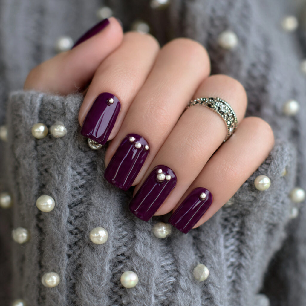 23 Purple Winter Nails That Feel Soft, Trendy, and Pretty 21 a person wearing elegant and refined purple