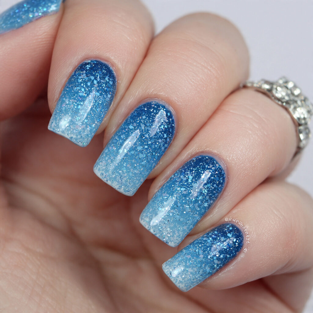 arctic blue sparkle ombre nails