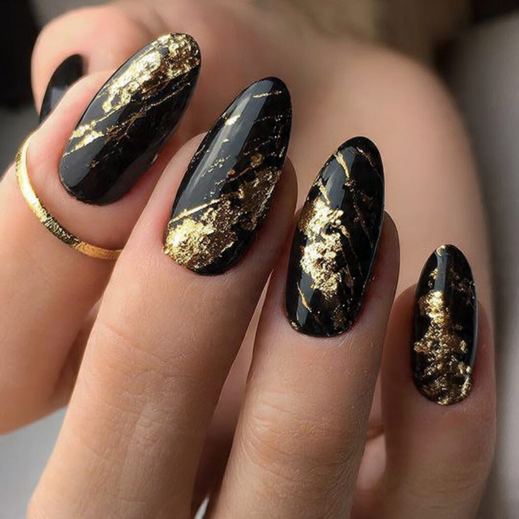 black and gold nails bring a rich