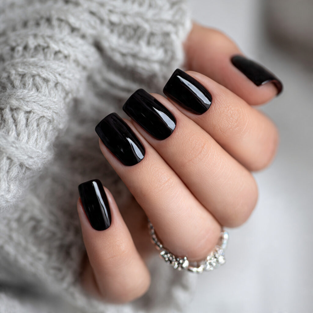classic glossy black nails for a timeless