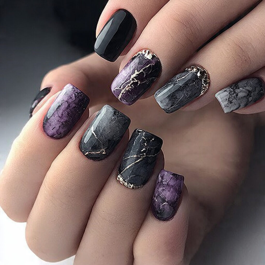 dark marble nails are artistic and unique