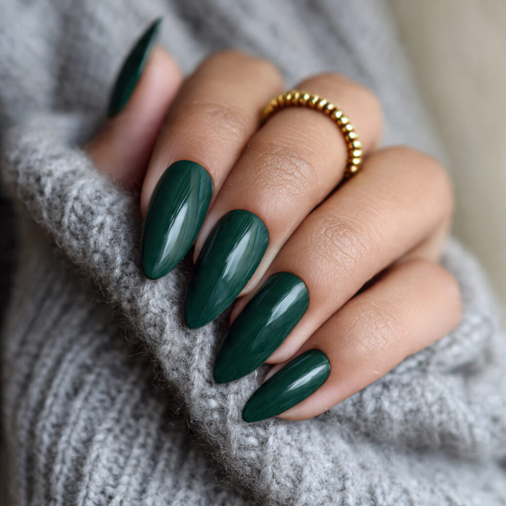 emerald green almond nails look luxurious and