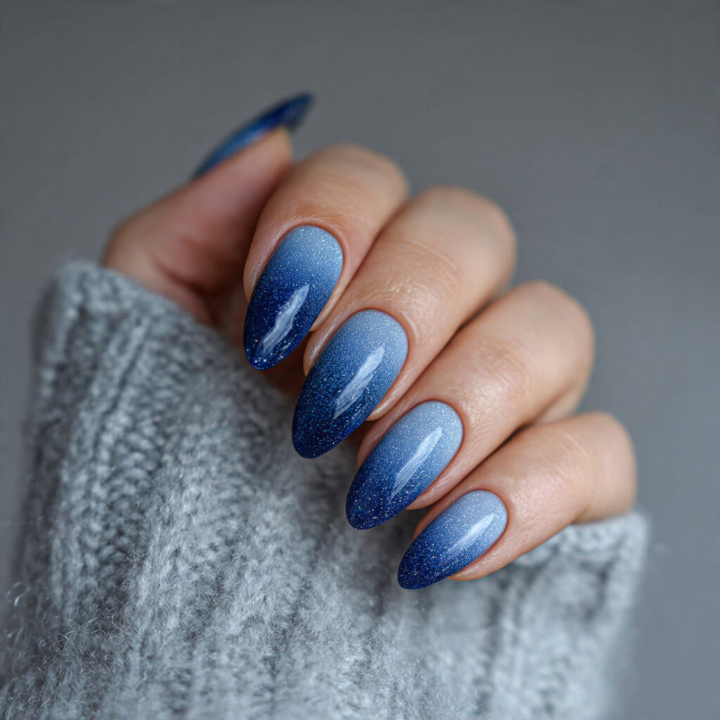 27 Navy Blue Winter Nails That Feel Cozy, Bold, and Chic 3 frosty night gradient navy winter nails feel