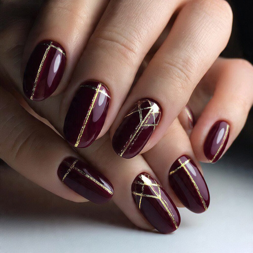 27 Burgundy Winter Nails That Feel Cozy, Rich, and Chic 26 golden geometric burgundy nails feel bold and