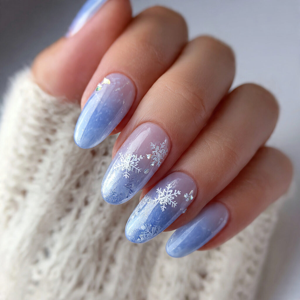 icy pearl nails featuring soft blue bases