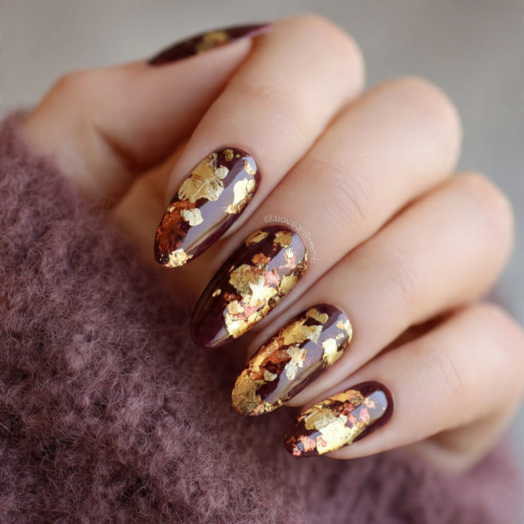 25 Fall Nail Ideas to Try This Season for a Cute, Cozy Look 4 leafy gold foil nails capture the glow
