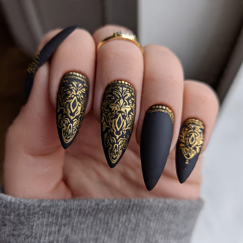 matte black nails with gold details pin