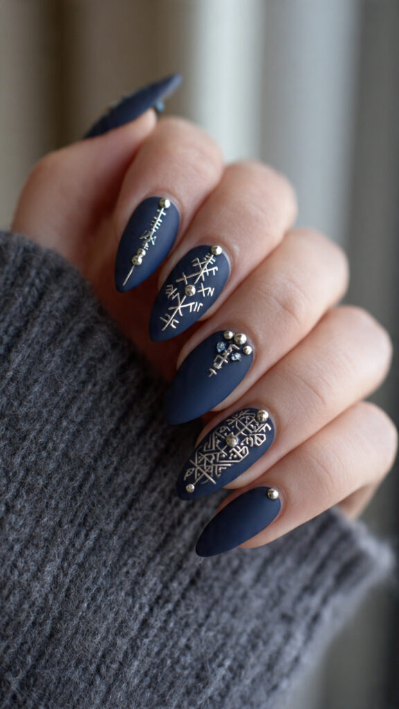 matte navy blue nails with silver runes