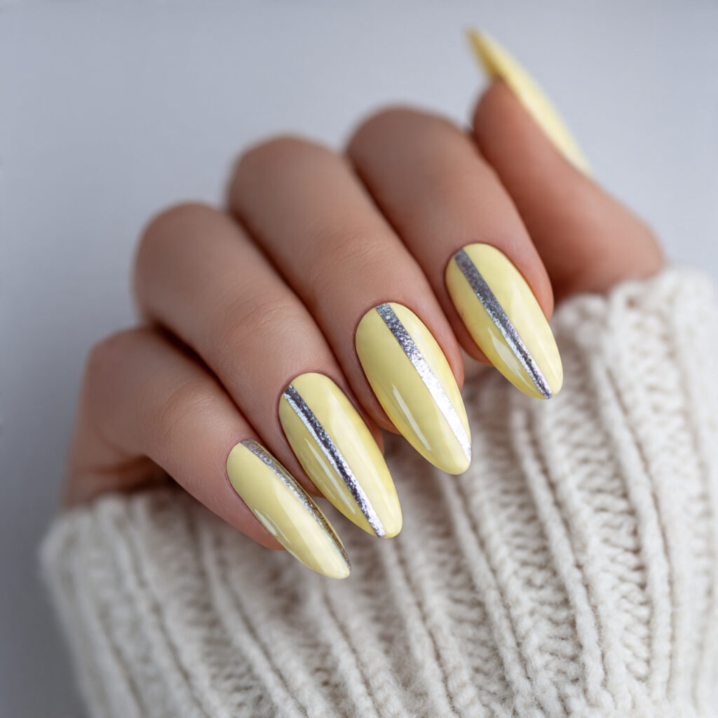 yellow nails with metallic stripes for a 1