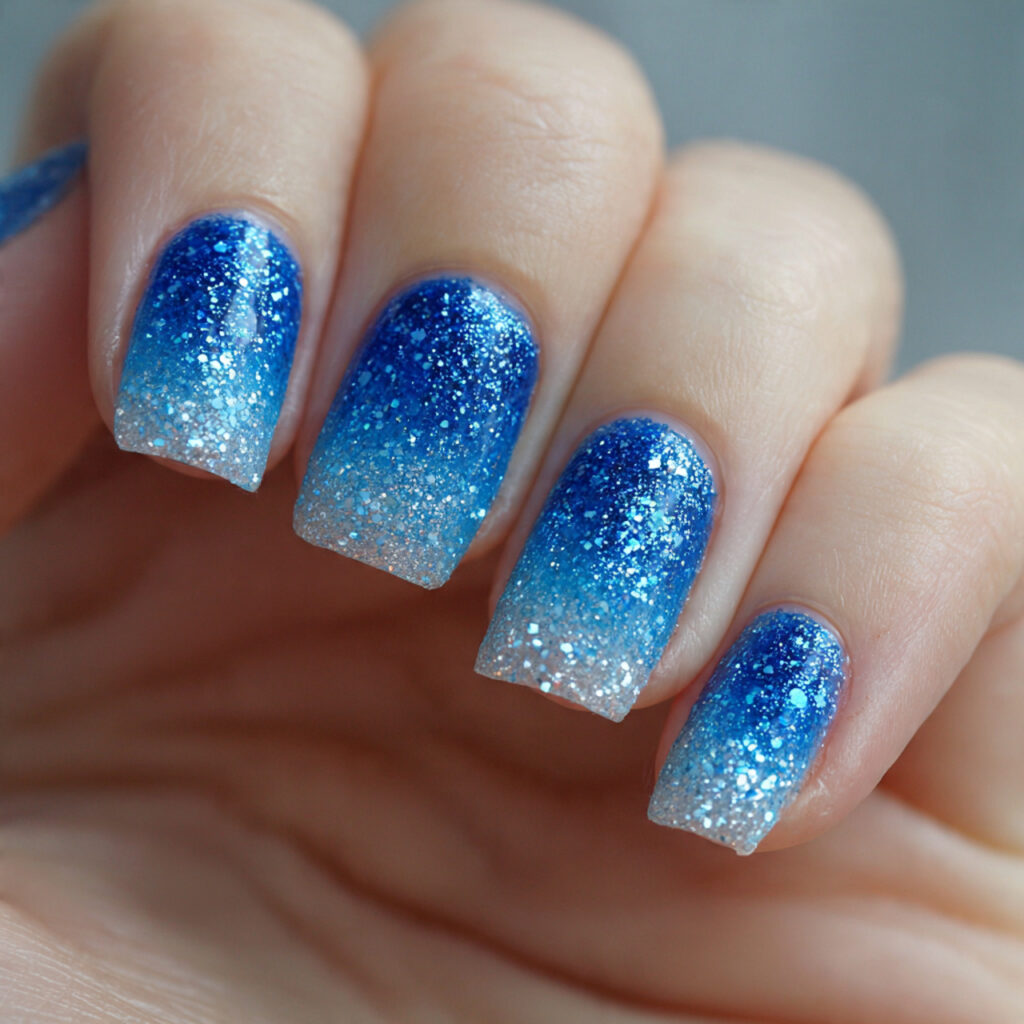 blue glitter gradient nails transition from solid