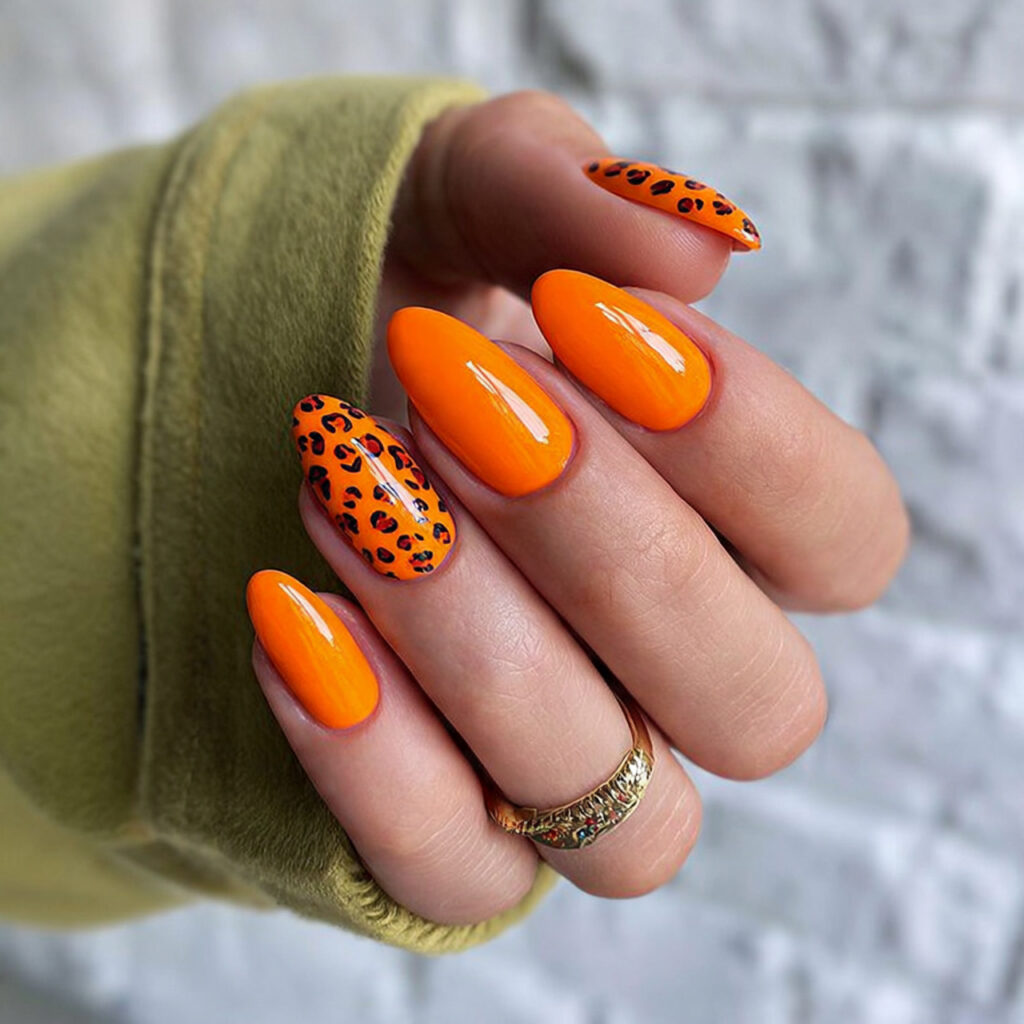 25 Leo Nail Ideas That Are Bold, Glam, and Confident 6 bold orange nails are a vibrant leo 1