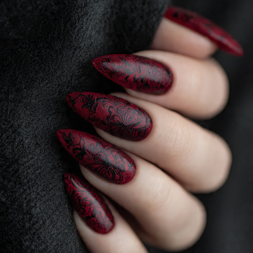 close up photo of long almond shaped nails painted