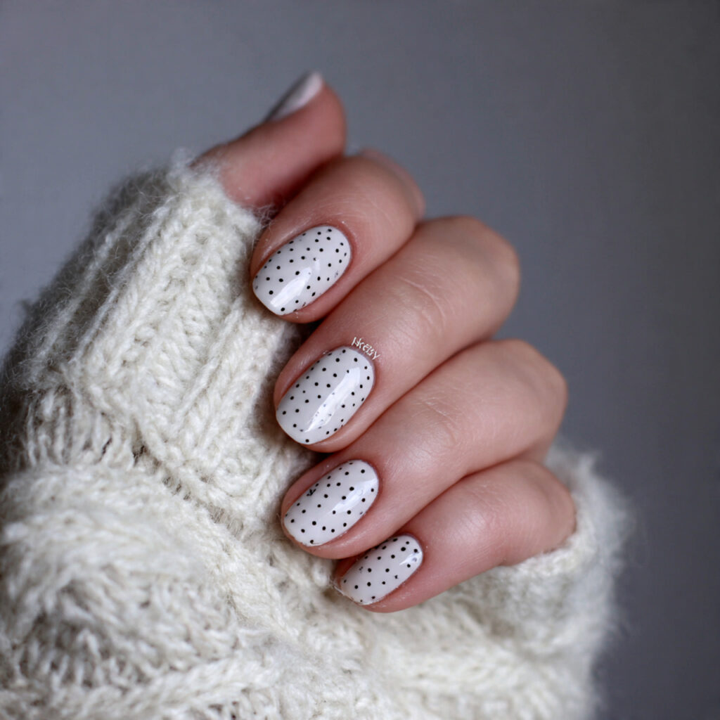 milky nails with minimal love dot