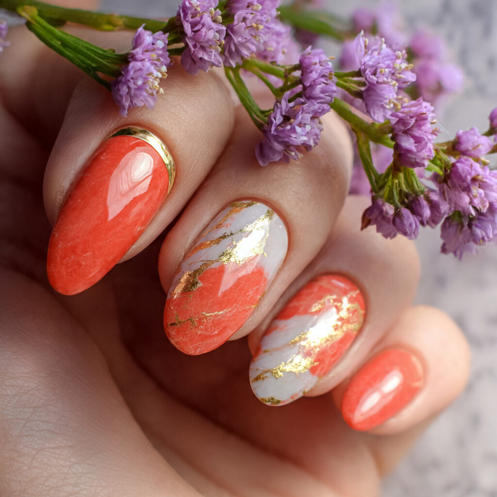 nails with coral and gold polish