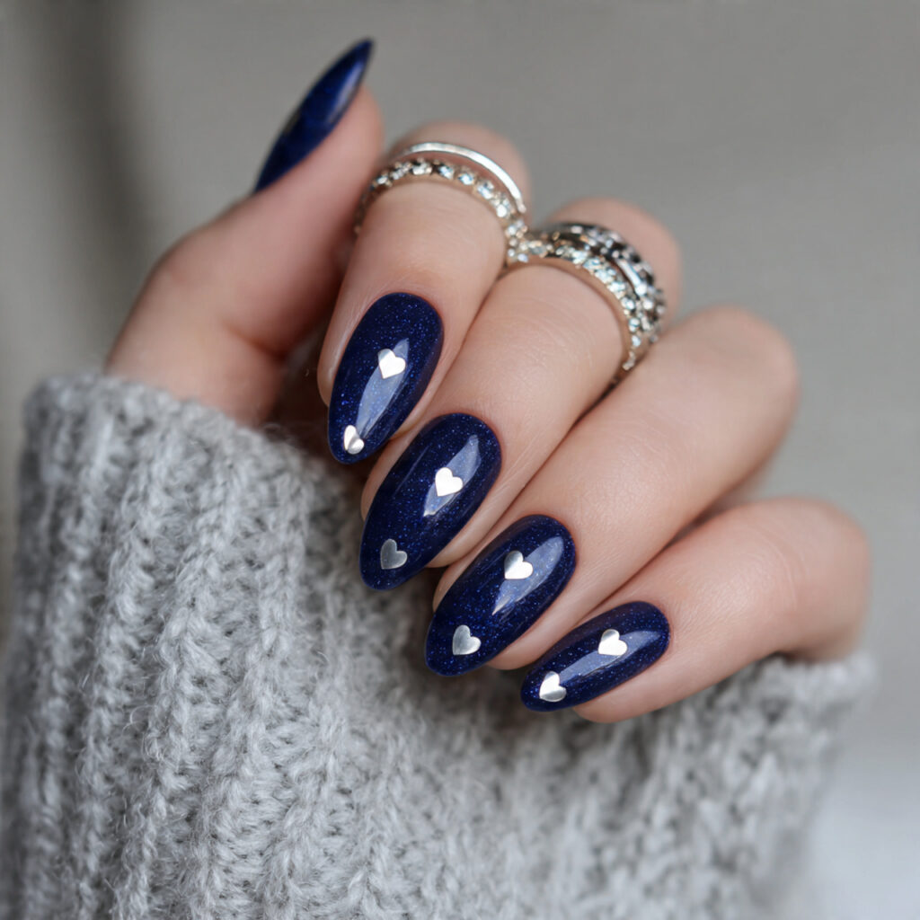 navy blue cat eye nails with small