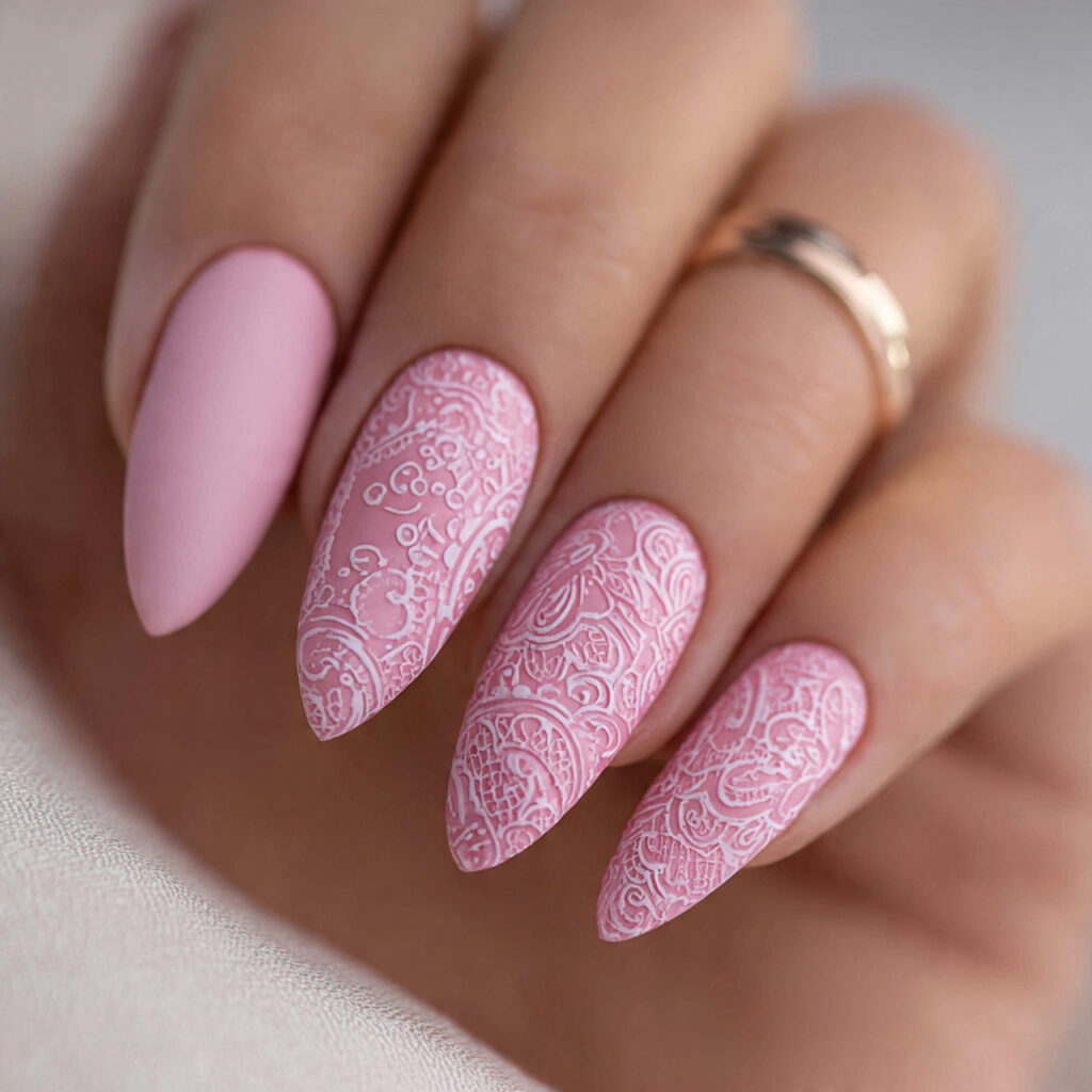 pink lace patterns create intricate valentine nails