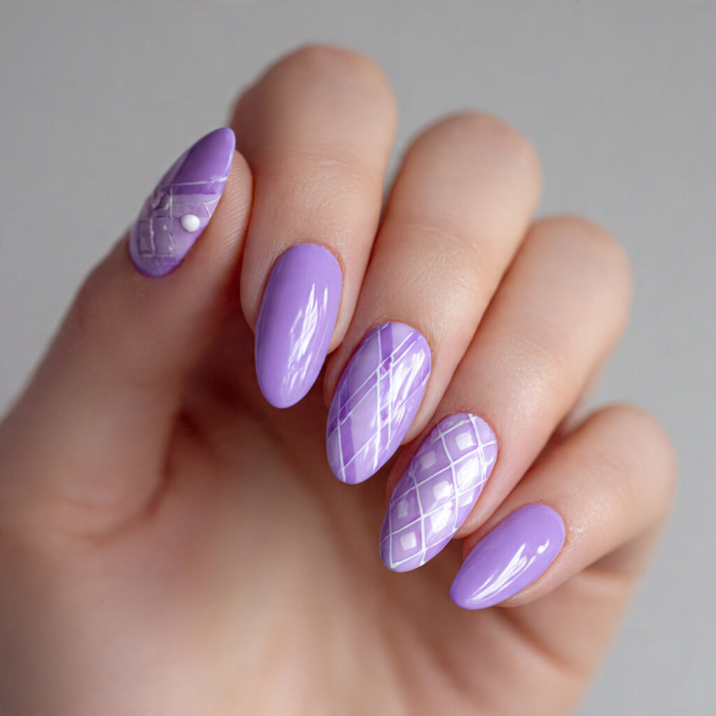 purple nails with white accent patterns