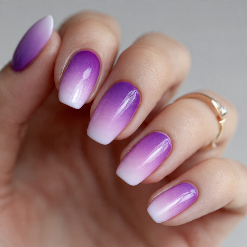 purple ombr nails feature gradual color transitions