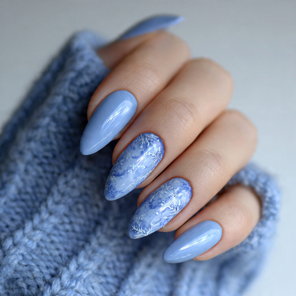 soft blue january nails on almond shapes