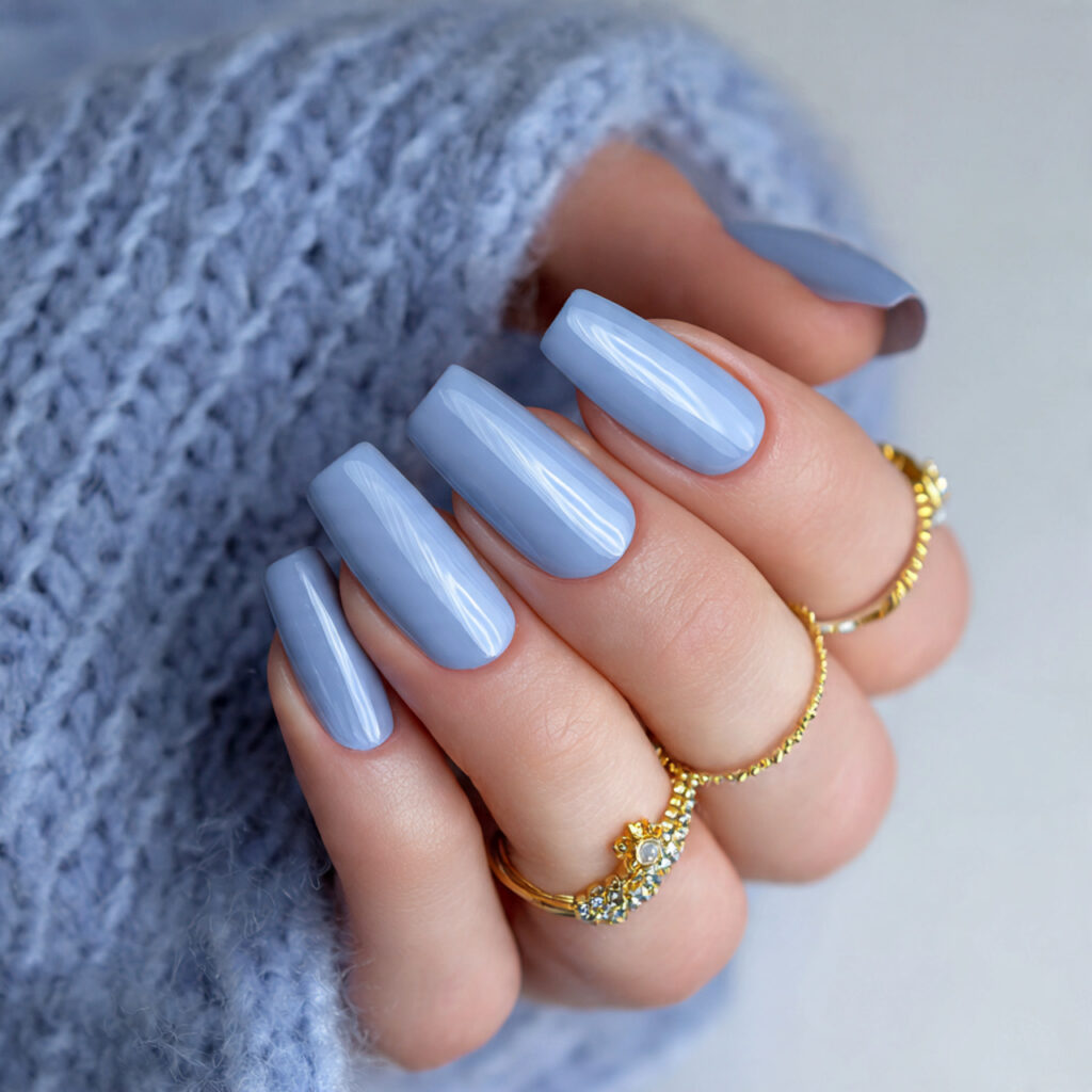 soft blue january nails with a glossy