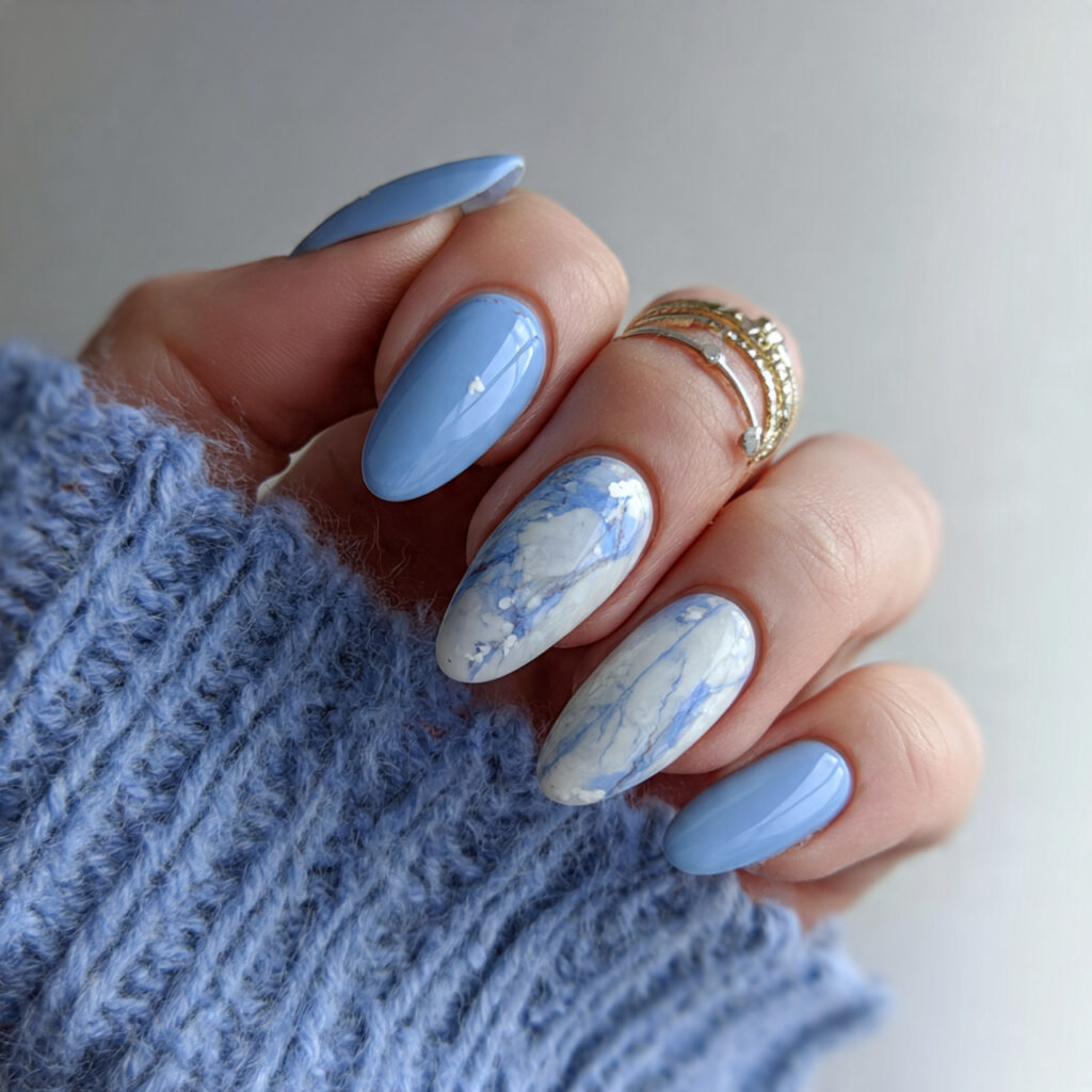 soft blue january nails with white accents
