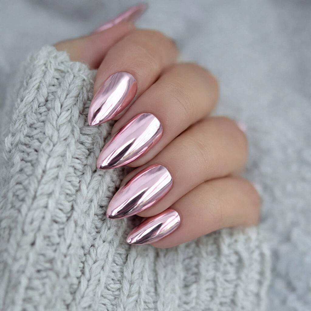 soft pink chrome nails give a smooth