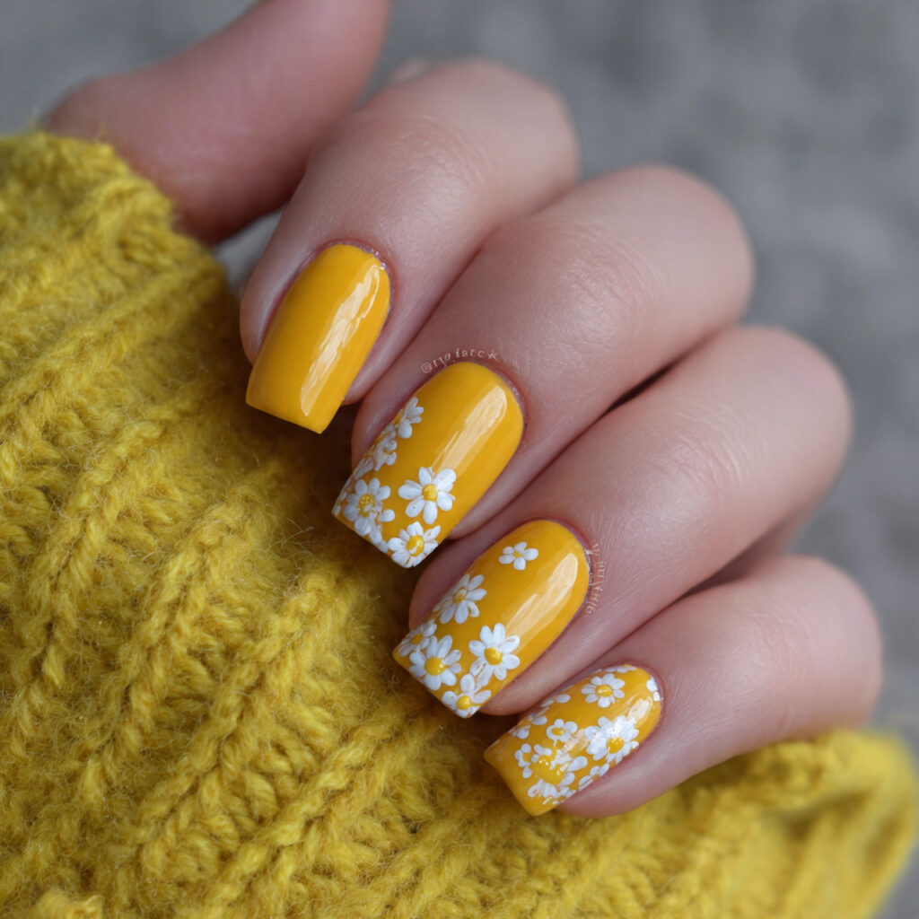 sunshine yellow with daisy accents nail art