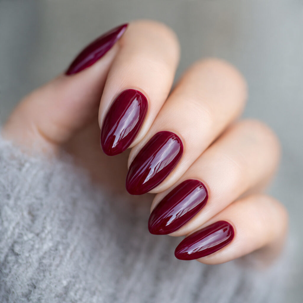 paint all nails in deep burgundy with