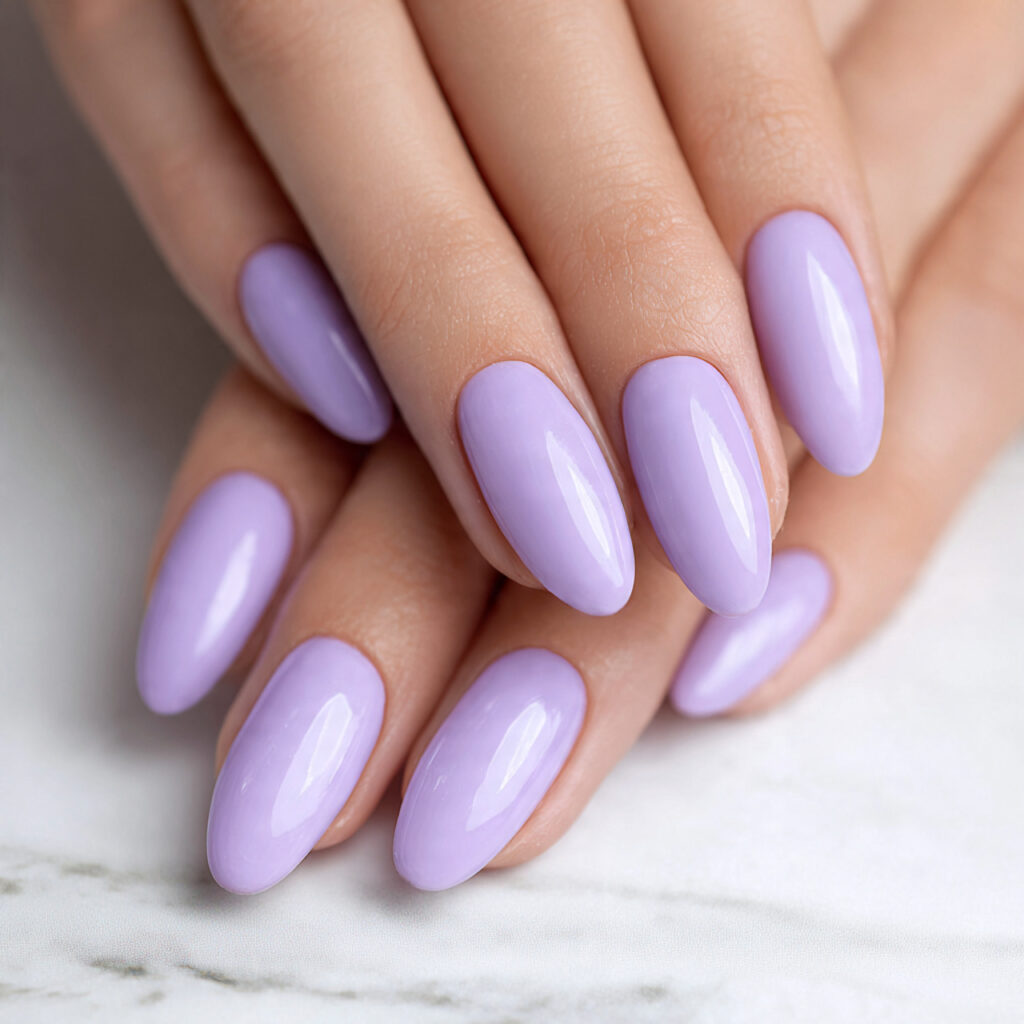 perfect oval shaped nails in soft lavender polish